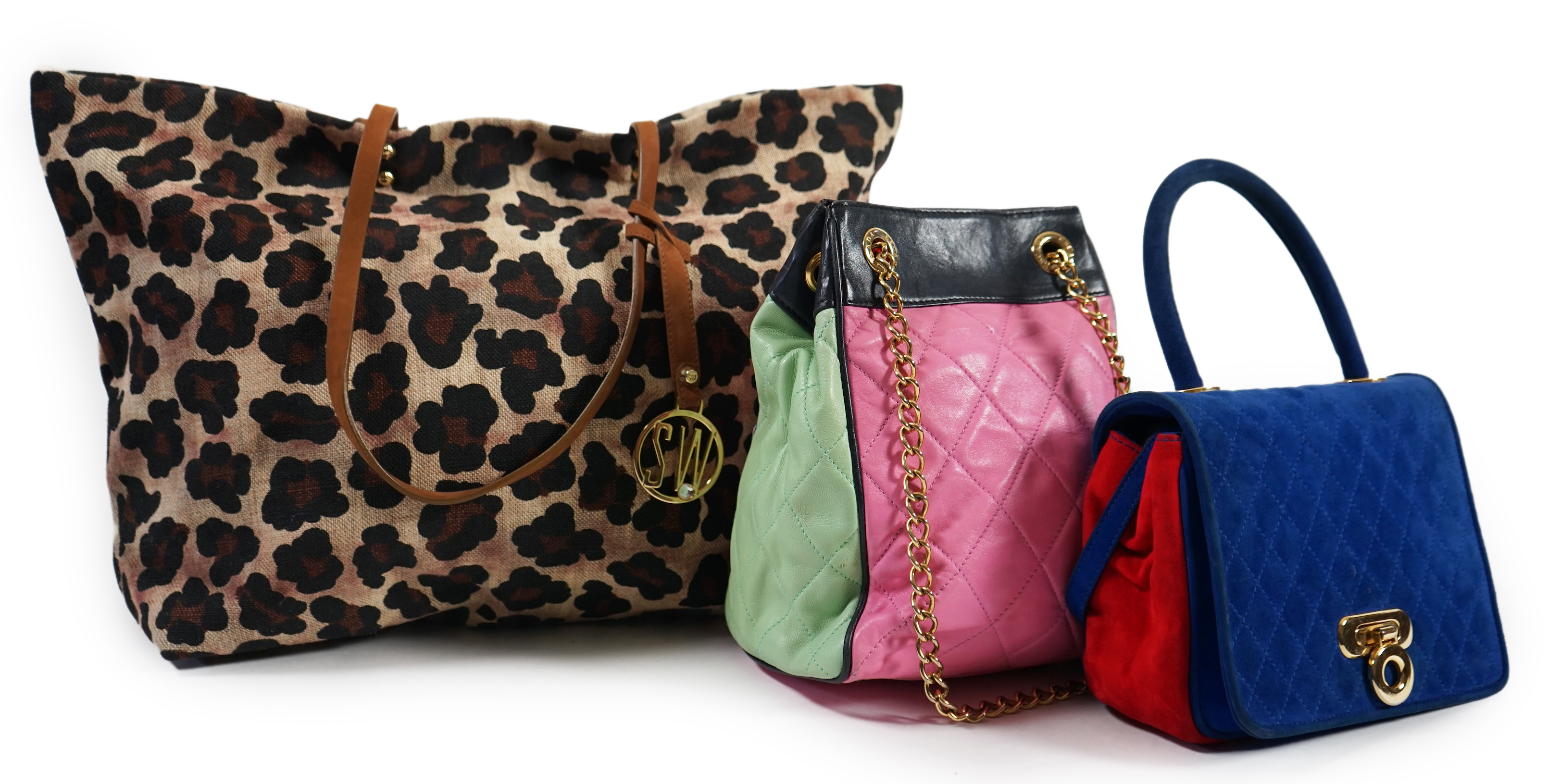 A selection of lady's handbags, including an animal print Stuart Weitzman shoulder bag with dust bag, an Escada suede royal blue and red shoulder bag, and another Escada handbag in navy blue with pink and light green qui